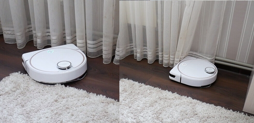 L'aspirateur robot nettoie le long des rideaux.