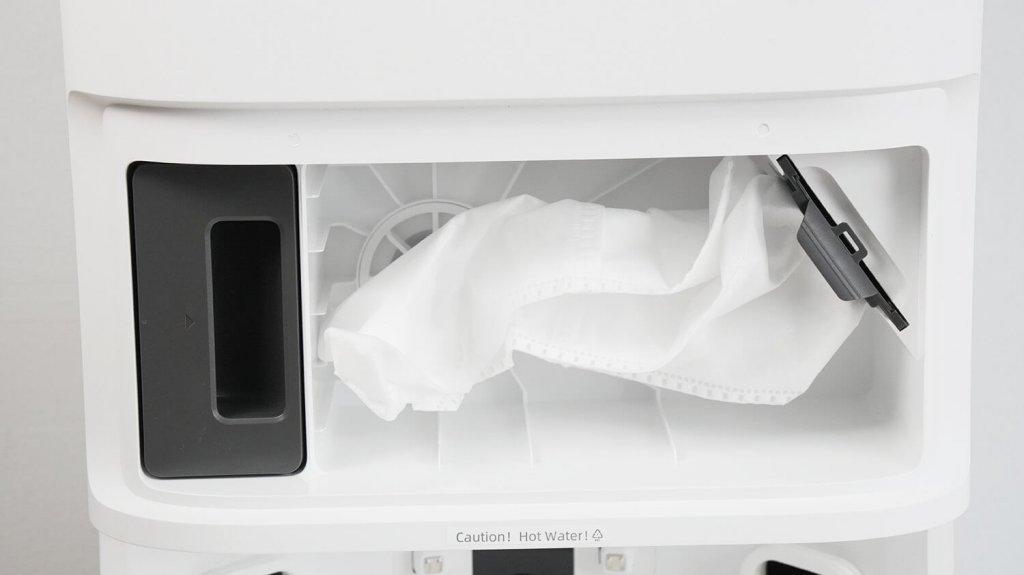 Aspirateur DreameBot L10s Pro Ultra Heat : Sac à poussière et réservoir de détergent