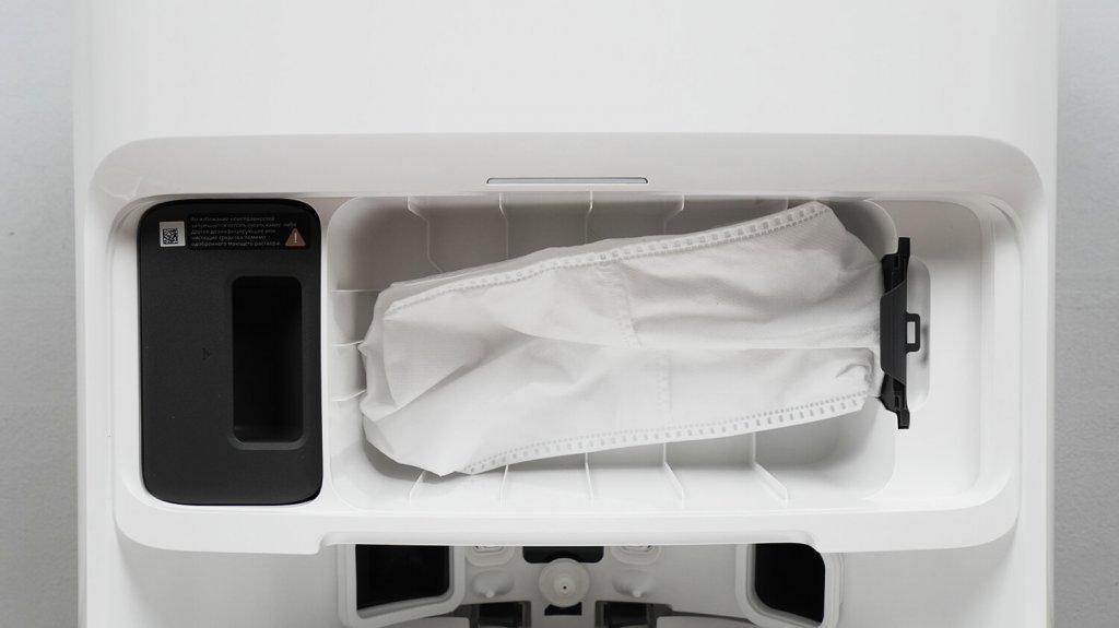 Trouver V50 Ultra Complete : emplacement du distributeur de sacs et de détergent